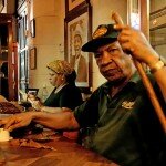 Famous cigar rollers at the Partagas factory in Havana, Cuba